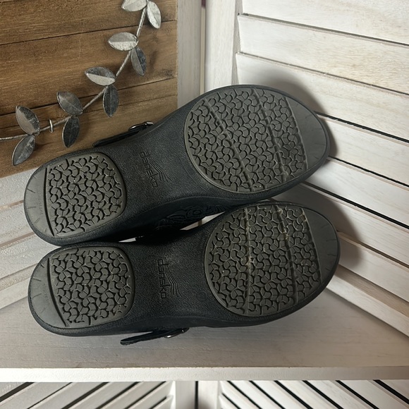 Dansko Black Floral Tooled Clogs - Picture 6 of 6